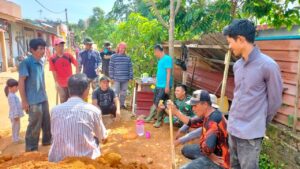 Personel TMMD dan Warga Kavling Seraya Sambau Rayakan Hari Kebangkitan Nasional Dengan Sukacita