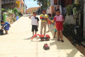 Kebahagiaan Warga Kavling Seraya Mendapati Semenisasi Jalan Dari Kegiatan TMMD